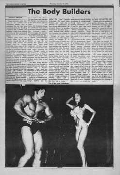 A washboard stomach, bounce-a-quarter-off-the-abs  sexy Kellie poses with hulking bodybuilding at competition. Pic accompanying Soho Weekly News article on Body Building